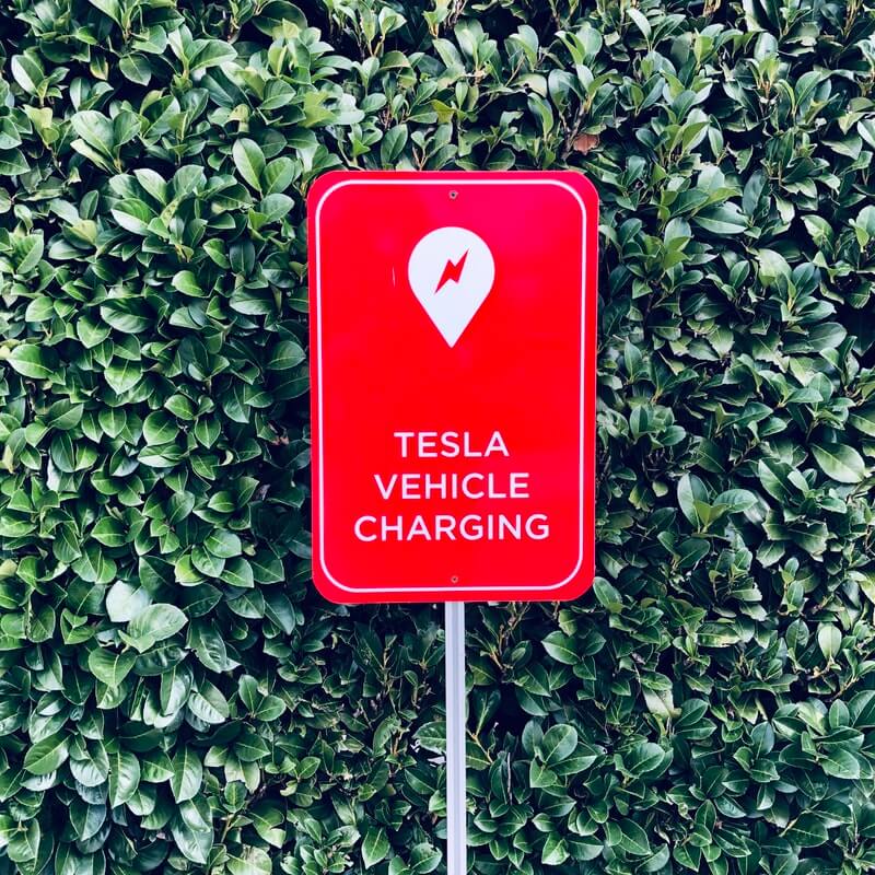 Picture of a Tesla Charging Sign