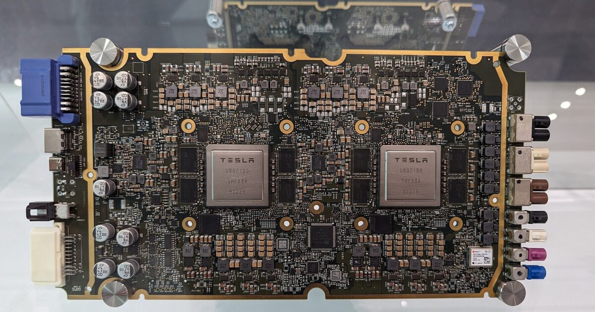 Tesla FSD computer board with two Tesla-branded chips