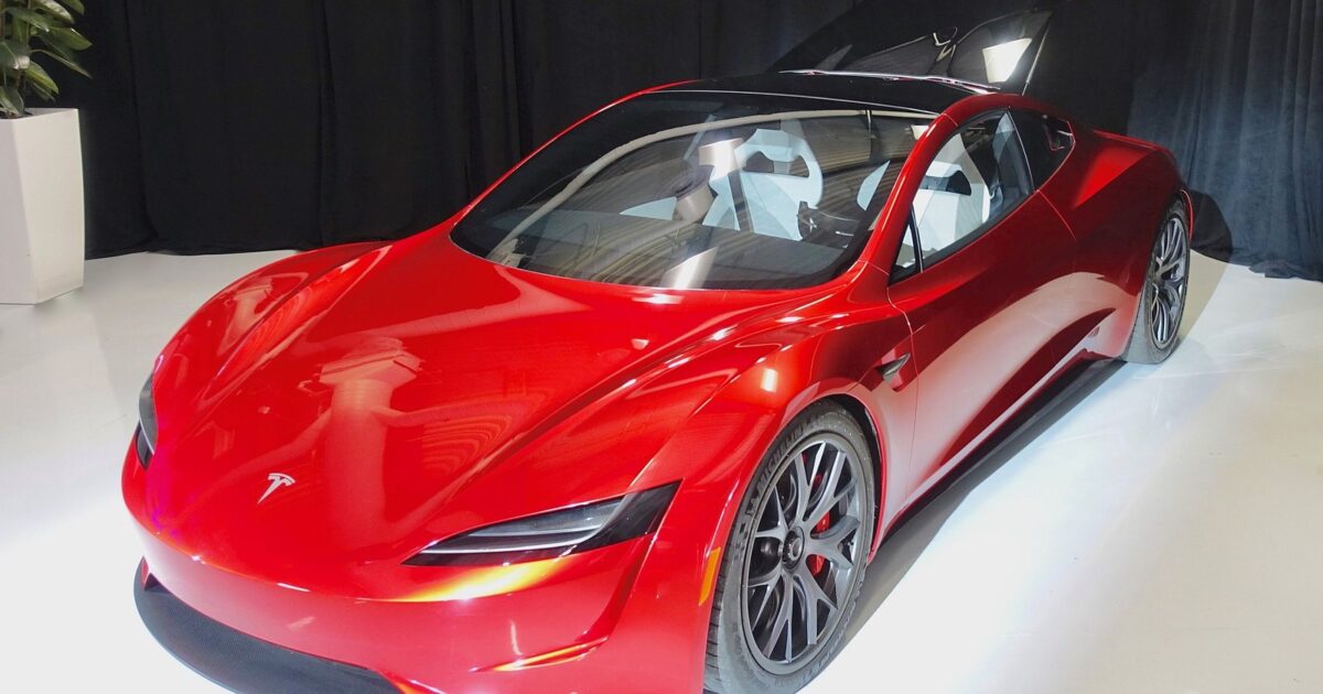 Red Tesla Roadster 2.0 prototype displayed indoors