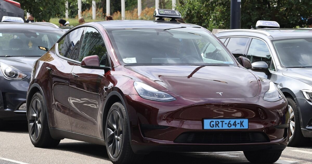 Tesla Model Y taxi in Rotterdam, Netherlands with Dutch plate