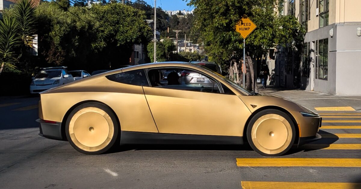 Tesla Cybercab driving on a city street