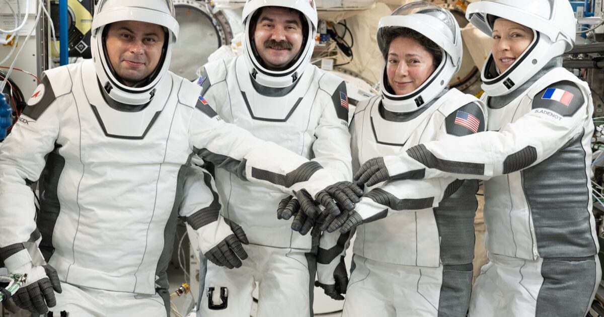 Official NASA photo of the four SpaceX Crew-12 astronauts in pressure suits aboard the International Space Station